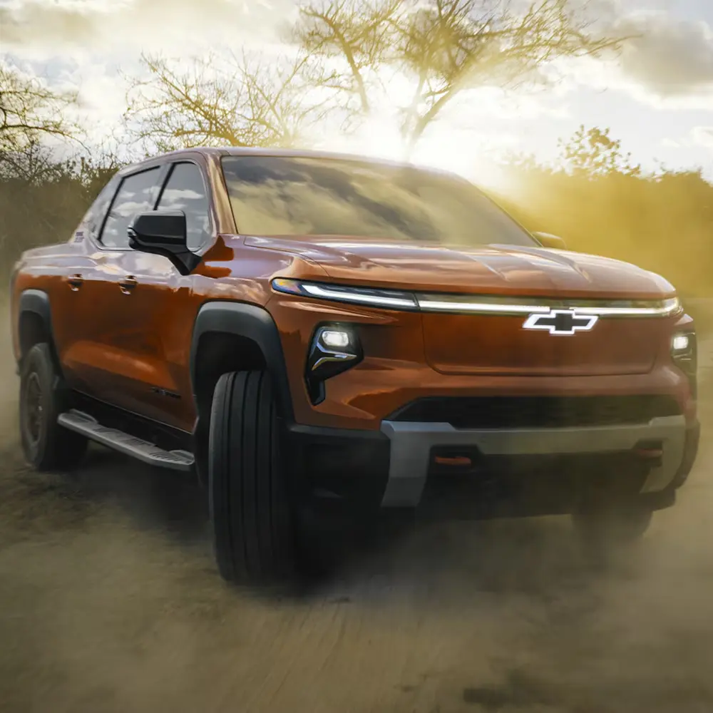 2026 Chevrolet Silverado EV driving off pavement