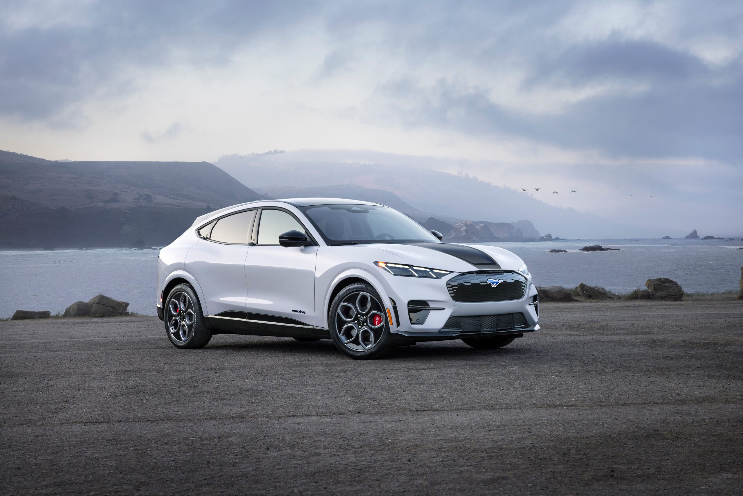 Ford Mustang Mach-E electric SUV shown in a dramatic front three-quarter view