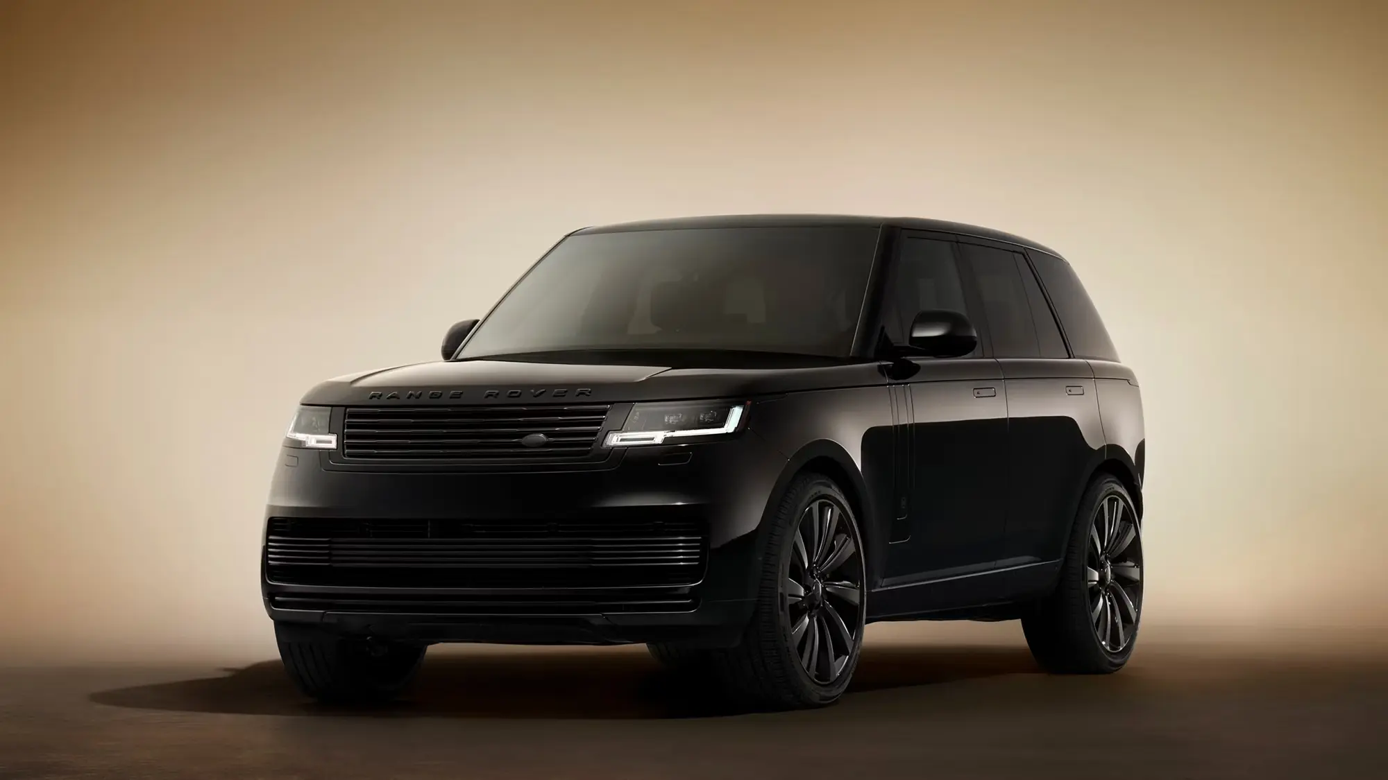 Range Rover SV Black in a dark studio setting